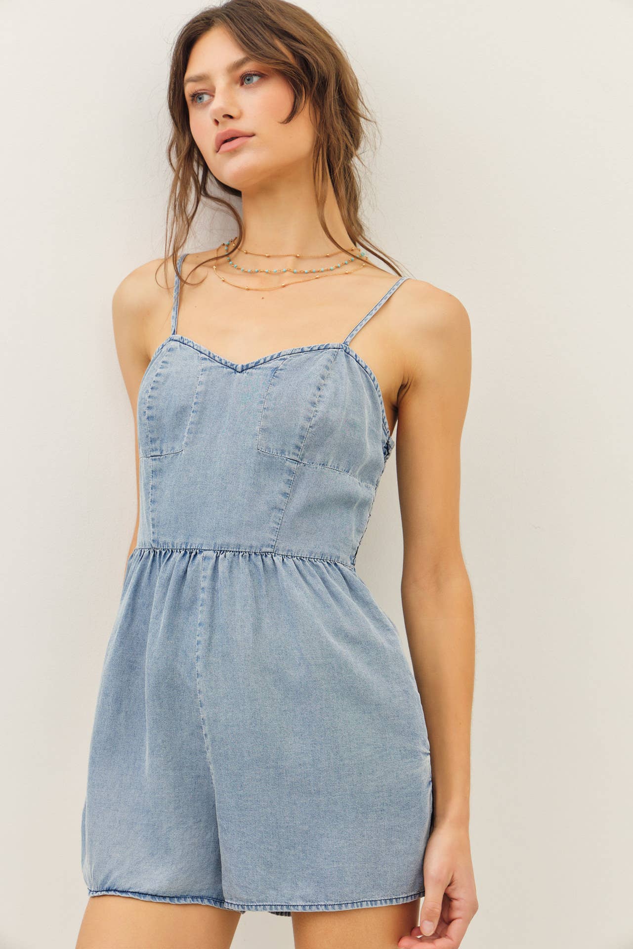 WASHED TENCEL ROMPER WITH SMOCKED BACK